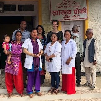 group standing in front of clinic
